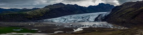 Glacier, glacier tongue, glacier lake, mountains, cloudy, aerial view, panorama, summer,
