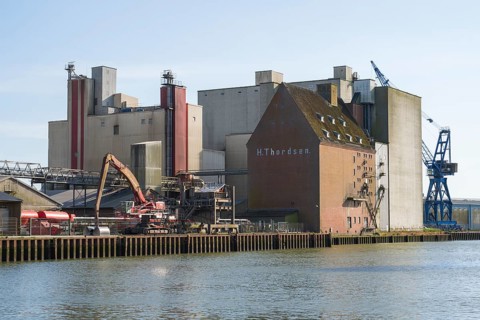Grain silos, warehouses, land trade, outer harbour, Husum, North Frisia, North Sea,