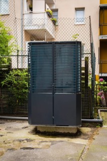 Heat pump in a backyard in Wuppertal, Germany, digitally reworked