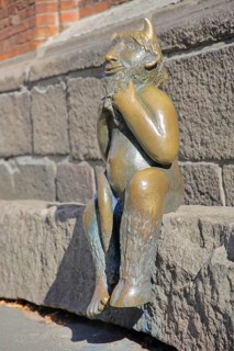 Sculpture Devil by Rolf Goerler 1999 sitting on the Devil's Stone, bronze sculpture, modern art, St