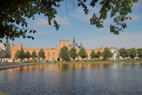 Pfaffenteich with arsenal, church tower of St Paul's Church, shore, lake, Schwerin,
