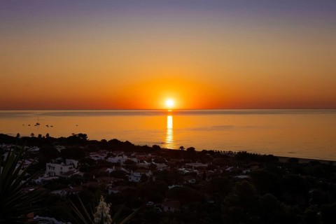 The sun rises on the Costa Rei, a stretch of coastline on the Italian Mediterranean island of