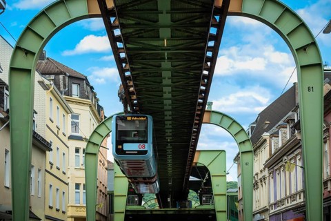 The Wuppertal suspension railway pulls into the Sonnborn stop, Wuppertal, Germany, digitally