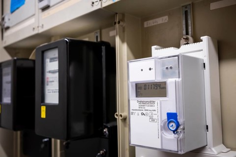 Various rotary electricity meters in a control cabinet in Wuppertal, Germany, digitally reworked