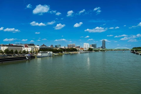 View of the banks of the Danube and the Bratislava skyline from the Bridge of the Slovak National
