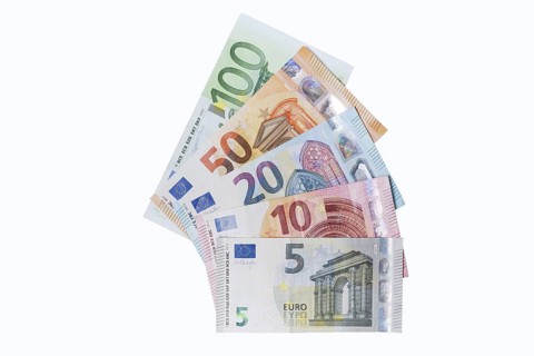 Various euro banknotes on white background, 5 euro, 10 euro, 20 euro, 50 euro, 100 euro