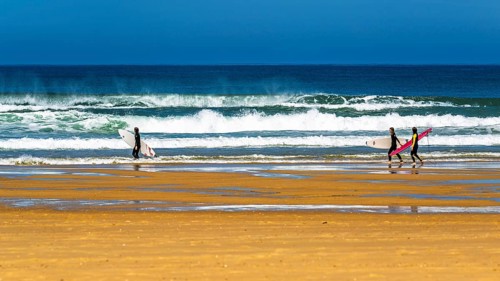 Surfer on Contis beach, Saint Julien en Born, Saint-Julien-en-Born, Landes, France