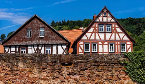 The old town centre with half-timbered houses, church towers and remains of the town wall in
