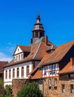 The old town centre with half-timbered houses, church towers and remains of the town wall in