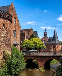 The old town centre with the town wall and the Seemenbach stream, Büdingen, Hesse, Germany