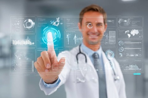 Doctor touching a medical interface in the hospital. Concept of new medical technologies and