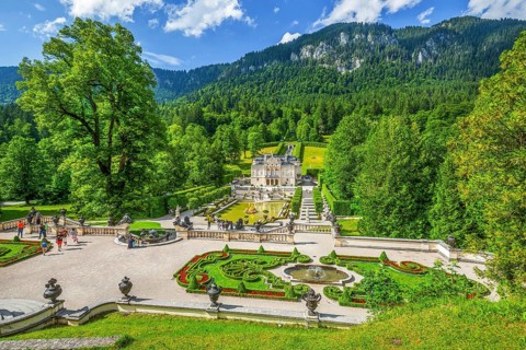 Baroque gardens at the Temple of Venus with a view of the water parterre and Linderhof Palace,