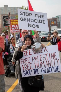 Detroit, Michigan USA - 26 July 2025 - Protesters rally at Eastern Market, banging empty pots to
