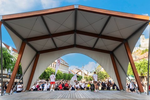 An event by a local fitness centre takes place on a stage on Peace Square, Capital of Culture 2026,