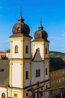 View from the city tower of the Piarist Church of St Francis Xavier and the old town in the evening