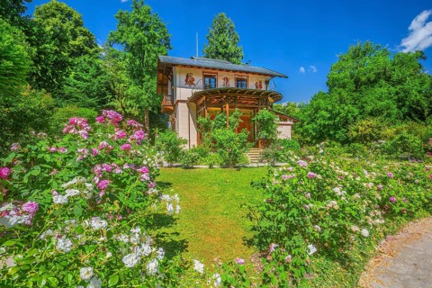 Rose garden in front of the Pompeian-Bavarian casino on the Rose Island in Lake Starnberg,
