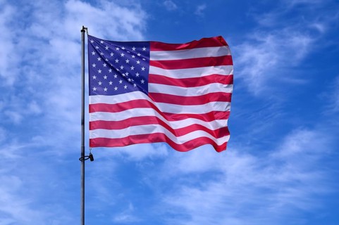 US flag, national flag USA, flies over National Guard memorial, memorial for US soldier Sgt. Frank