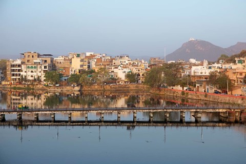 Udaipur and the Swaroop Sagar Lake in the morning light, Rajasthan, India