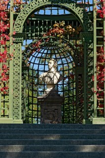 Decorative bust, nobleman in rococo style in the arcade, park of Linderhof Castle, UNESCO World