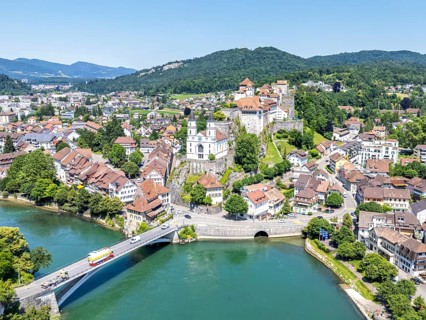 Aarburg town on the river Aare with church and fortress Aerial view from above in Aarburg,