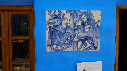 Restaurant Mylos, Blue wall tiles with a musician and a woman in a living room, Agia Marina, Leros,