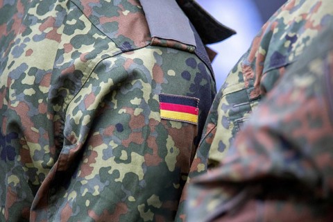 Bundeswehr symbolic image: close-up of the German flag on the Bundeswehr uniform
