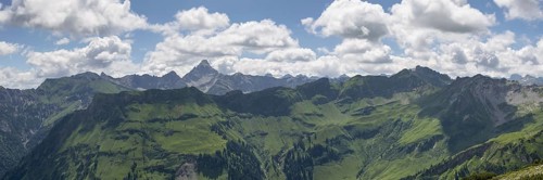 Mountain panorama from the Koblat high trail on the Nebelhorn over the Obertal valley with lush