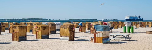 Beach chairs on sandy beach, ferry boat, Laboe, Baltic seaside resort, fjord, Baltic Sea, North
