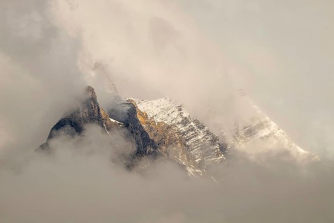 Small and large Bettelwurf with a thin layer of snow, behind wispy clouds, Small and large
