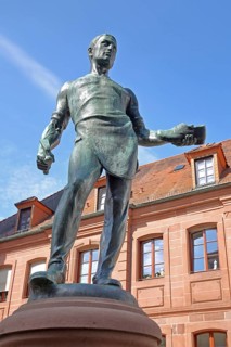 Cobbler's fountain with cobbler Johann Joß sculpture as a symbol of the former shoe industry and