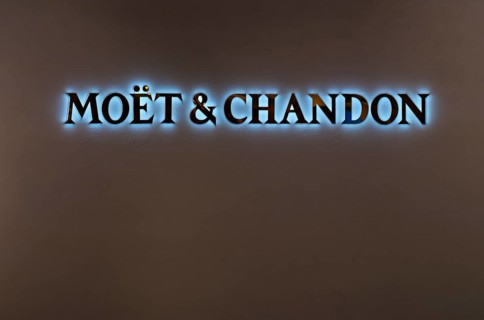 Logo, lettering, headquarters of the champagne brand Moët & Chandon, part of the luxury goods group