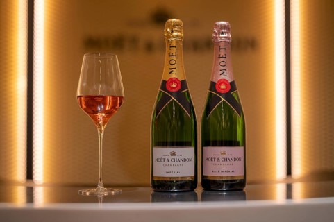 Bottle of Champagne Rosé and Impérial Brut, filled glass, logo, lettering, headquarters of the