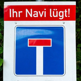 Sign with warning, incorrect guidance by sat nav, your sat nav is lying