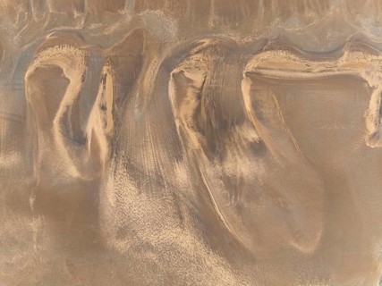 Low tide patterns in the ground of the Walvis Bay Lagoon. Aerial view. Drone shot. Namibia