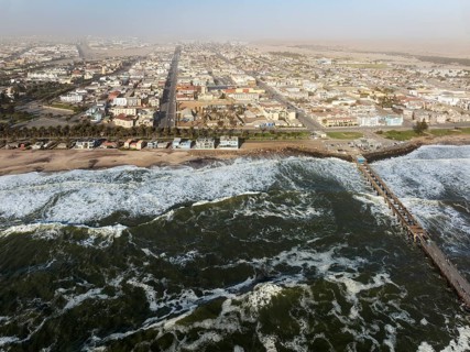 The coastal town of Swakopmund between Namib Desert and Atlantic Ocean. Aerial view. Namibia