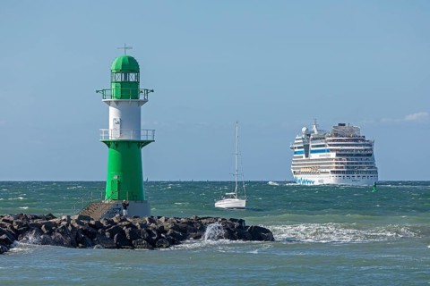 Cruise ship AIDA nova leaving, lighthouse, Warnow estuary, Baltic Sea, Warnemünde, Rostock,