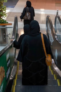 Shrouded woman with handbag, Abu Dhabi, United Arab Emirates