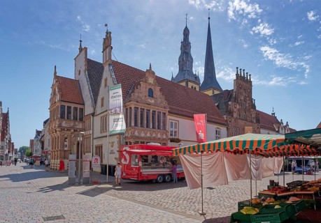Market stalls in front of Lemgo's town hall, located on the market square. The town hall was built