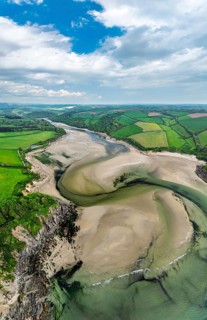 Panorama of Farms and fields over River Emme from a drone, Mothecombe, South Devon, England, United