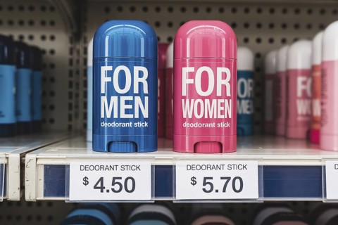 Gender-labeled deodorant sticks with unequal prices. Illustration of the pink tax in retail.