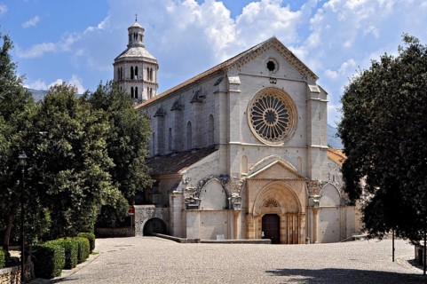 Main façade with rose window and portal, crossing tower, Gothic basilica of the Cistercian abbey of