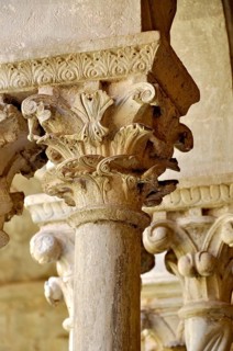 Slender Gothic columns with filigree capitals in the cloister, Gothic basilica of the Cistercian