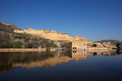 Amber Fort or fortress at Maota Lake on the Aravalli hill range, reflection in the water, Jaipur,