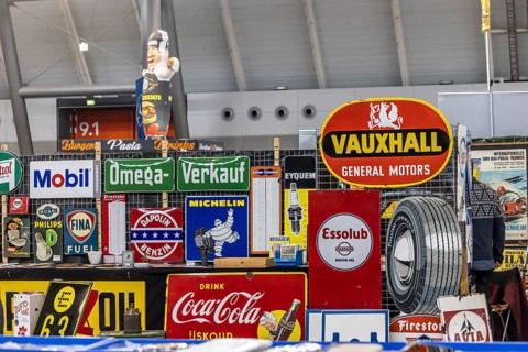 Historic enamel signs, collection of Vauxhall, Coca-Cola, Esso, Michelin and other brands from the