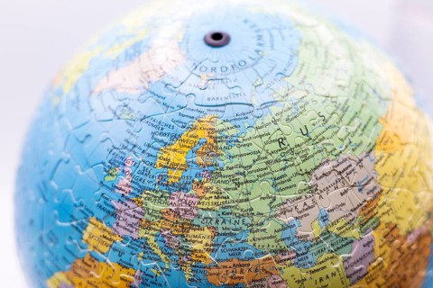 Puzzle globe. Map made from puzzle pieces