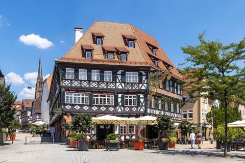Town view of Nagold in the northern Black Forest. Half-timbered house Hotel Post on the suburban