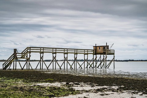 Fishing huts over Randonnee entre Histoire et Nature from a drone, Fouras, Fouras-les-Bains,