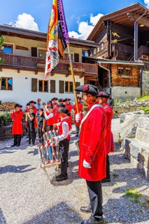 Pipers and drummers play in the historic village centre, Grimentz, Val d'Anniviers, Valais Alps,