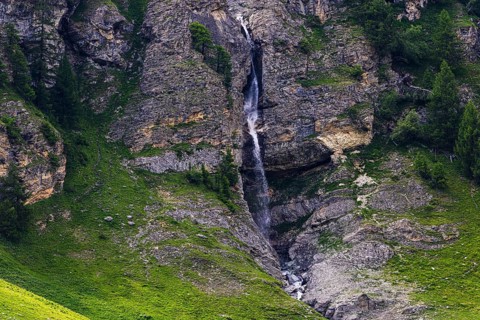 Waterfall cascading down a rock face, Zinal Valley, Val d'Anniviers, Valais Alps, Canton Valais,