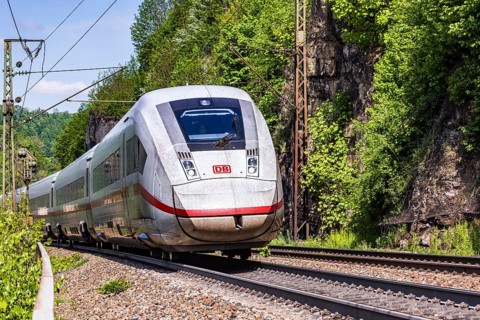 InterCityExpress ICE en route on the winding railway line of the Geislinger Steige. Landscape on
